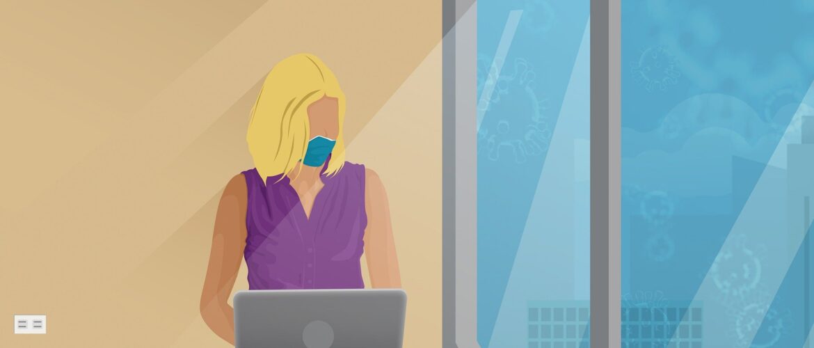 A picture of someone working from home, wearing a mask